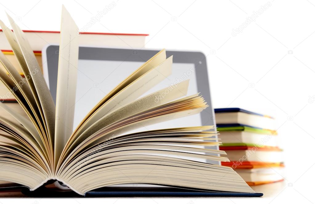 Composition with books and tablet computer isolated on white