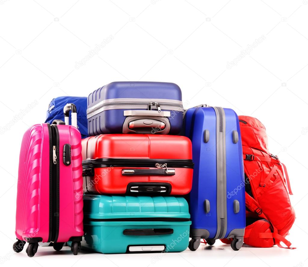 Suitcases and rucksacks isolated on white