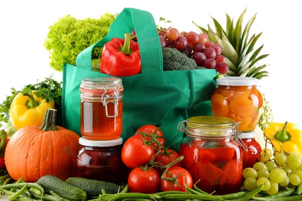 Composition with shopping bag and organic food over white — Stock Photo, Image