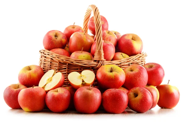 Apples in wicker basket isolated on white — Stock Photo, Image