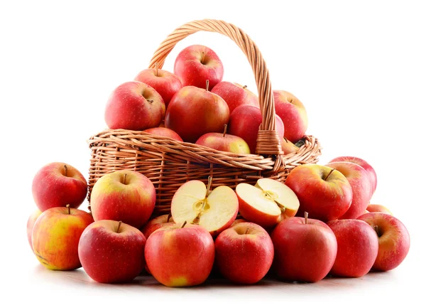 Apples in wicker basket isolated on white — Stock Photo, Image