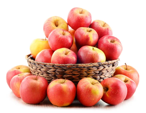 Apples in wicker basket isolated on white — Stock Photo, Image