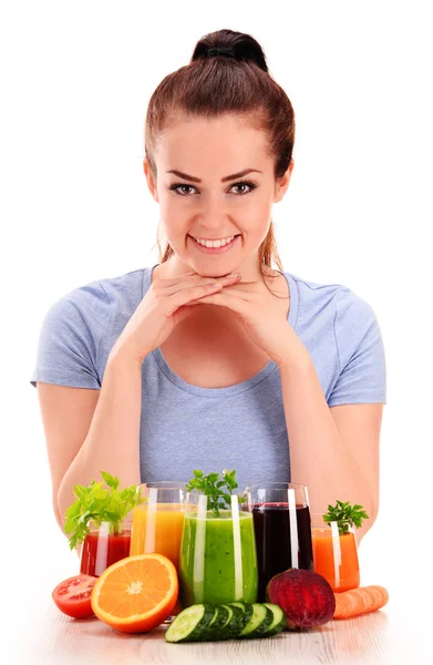 Young woman with variety of vegetable and fruit juices — Stock Photo, Image