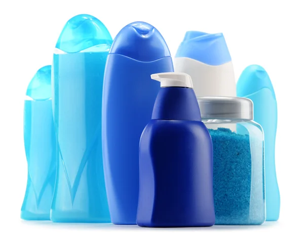 Plastic bottles of body care and beauty products over white — Stock Photo, Image