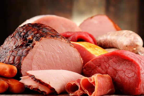 Meat products including ham and sausages — Stock Photo, Image