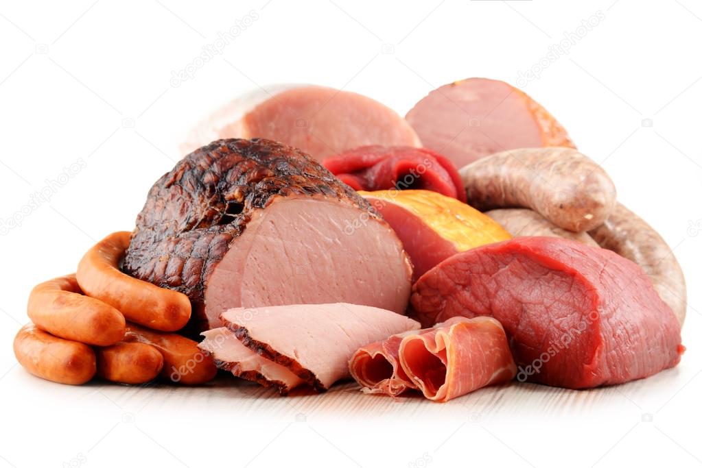 Meat products including ham and sausages isolated on white