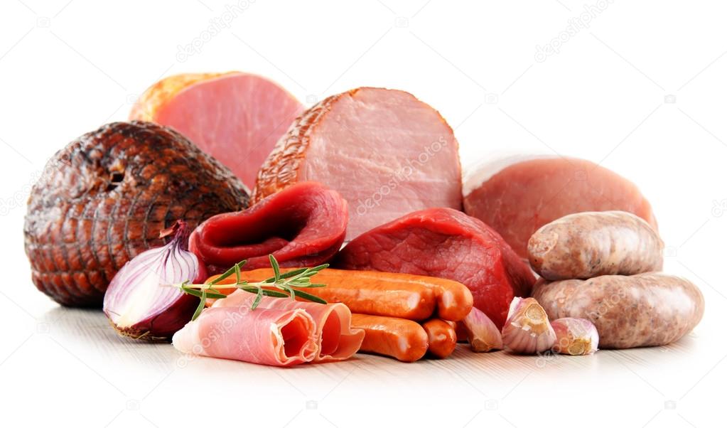 Meat products including ham and sausages isolated on white