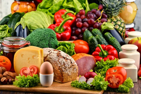 Organic food including vegetables fruit bread dairy and meat — Stock Photo, Image