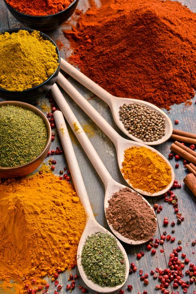 Variety of spices on kitchen table — Stock Photo, Image