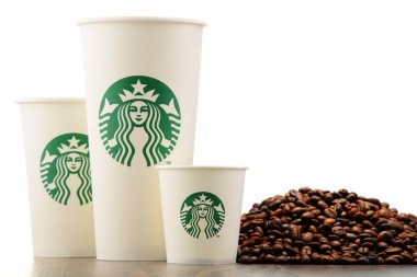 Composition with cup of Starbucks coffee and beans clipart