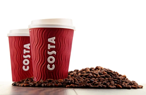 Samenstelling met kop van Costa koffie koffie en bonen — Stockfoto