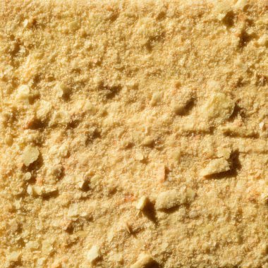 The texture of Napoleon cake from a high angle with hard light.