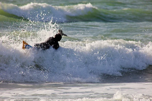 Unidentified bodyboader taking waves — Stock Photo, Image