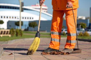Street Sweeper cleaning city sidewalk clipart