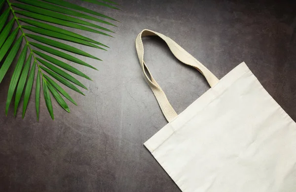 White tote bag canvas fabric. Cloth shopping sack mockup with copy space.