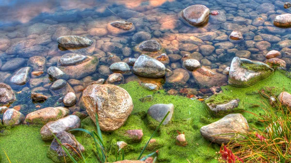 HDR of River edge rocks — Stock Photo, Image