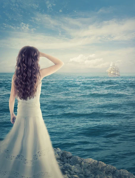 Girl waiting for a ship Stock Picture