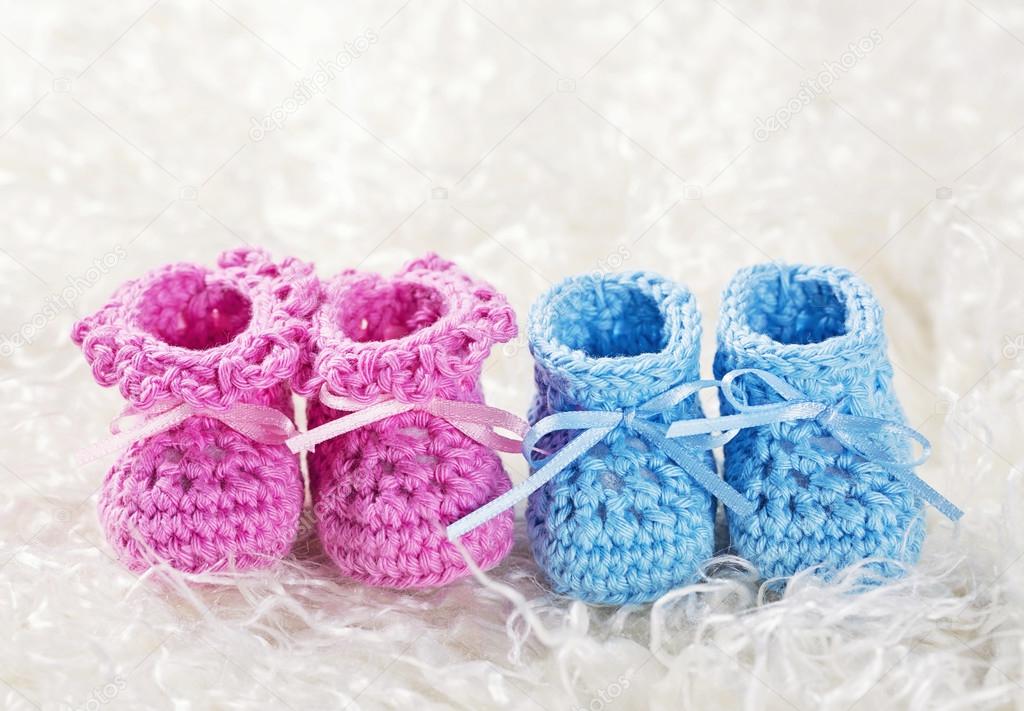 pink and blue baby booties