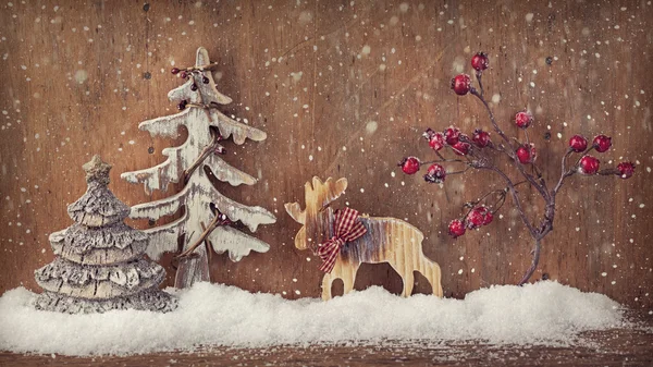 Winter decoratie op een houten achtergrond — Stockfoto