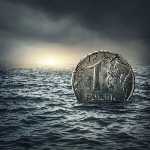 Ruble coin sinking in water