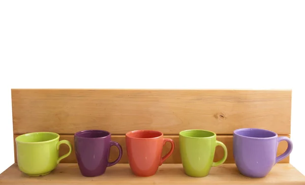 Egy sor színes poharak — Stock Fotó