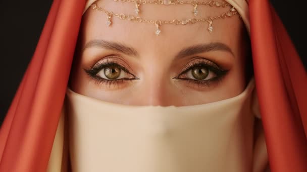 Close Up Portrait Of Beauty Young Muslim Woman In Hijab Looking At Camera. — Stock Video