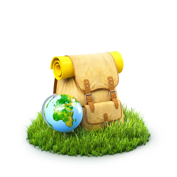 Backpack on grass — Stock Photo, Image