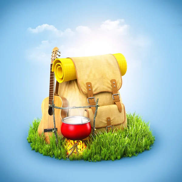 Рюкзак на траве — стоковое фото