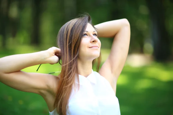 Young businesswoman relaxing in the park Royalty Free Stock Photos