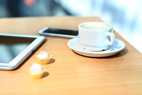 Laptop with tablet and smart phone on table Royalty Free Stock Images