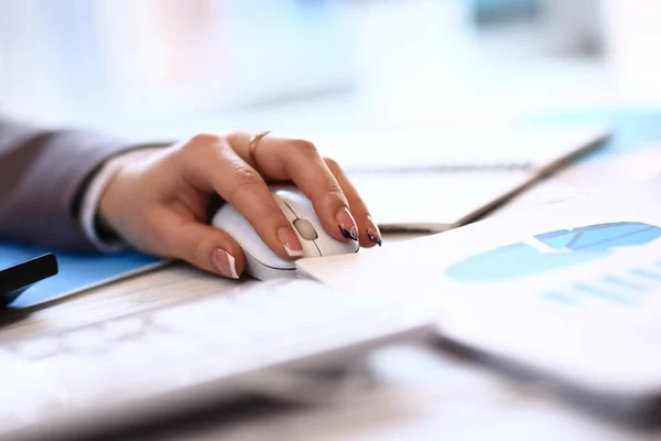 Image of female hand clicking computer mouse — Stock Photo, Image