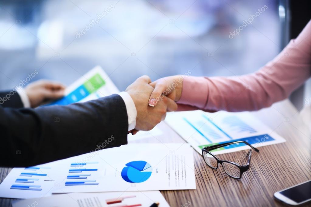 Business people shaking hands