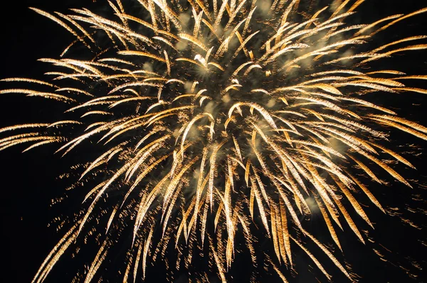 Colorful fireworks over dark sky — Stock Photo, Image