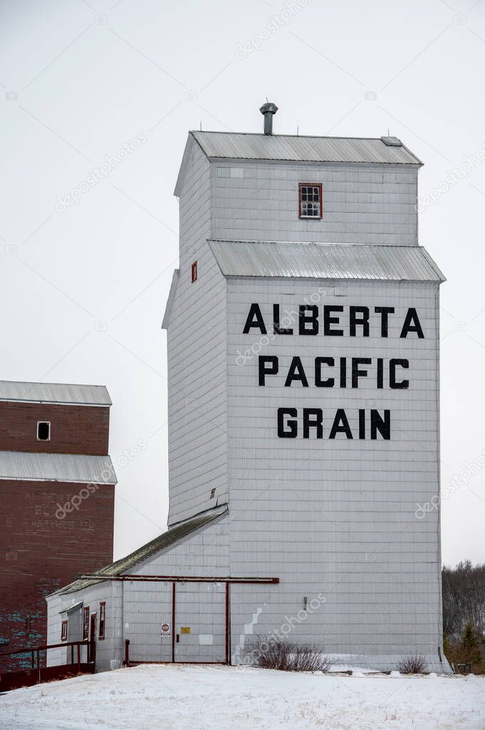 Meeting Creek, Alberta - April 11, 2021: Grain elevators in the small town of Meeting Creek.