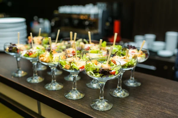 Beautifully decorated catering banquet table with different food — Stock Photo, Image