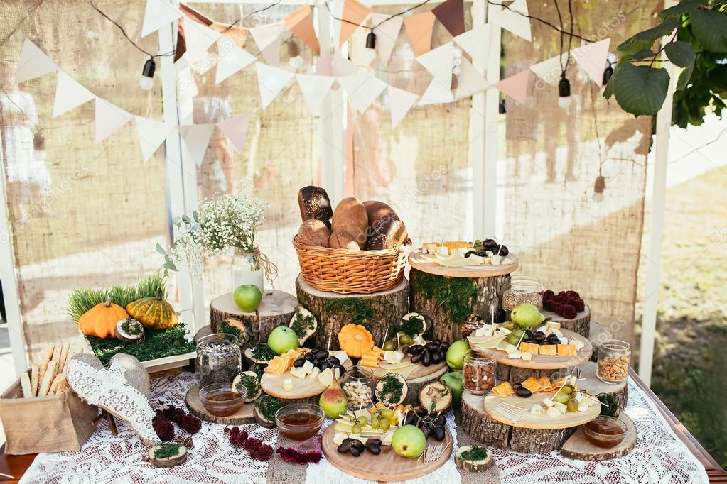 rustic bagging candy bar set up on wedding ceremony place