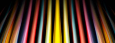 Soyut dikey çizgiler görüntüye hakim. Renkler karışır, dinamik görsel efekt yaratır. Siyah arkaplan parlak çizgileri vurgular.