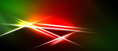 Parlak ışık çizgileri merkezi noktadan yayılır. Renkler harmanlanmış yeşil, kırmızı, sarı koyu arkaplan. Görünür dinamik enerji.