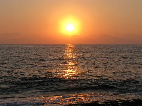 Zonsondergang aan zee — Stockfoto