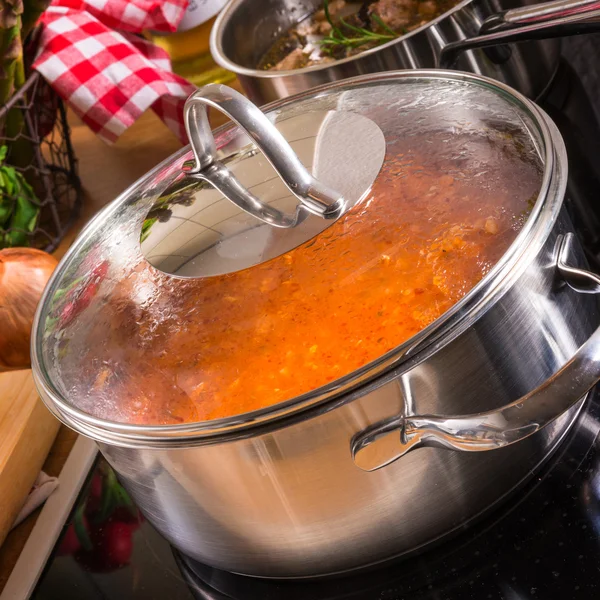 Cooking pots on the stove — Stock Photo, Image