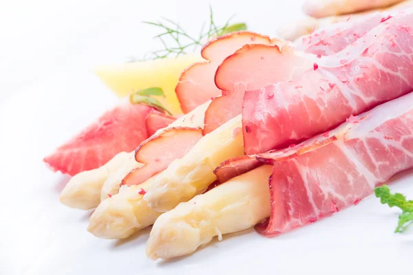 Baked asparagus with ham — Stock Photo, Image