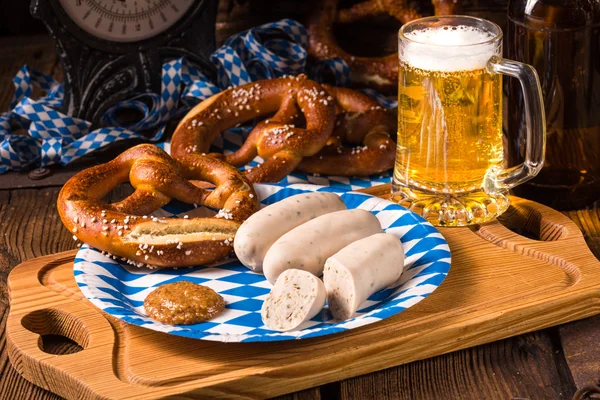 Bavarian sausage with pretzel — Stock Photo, Image