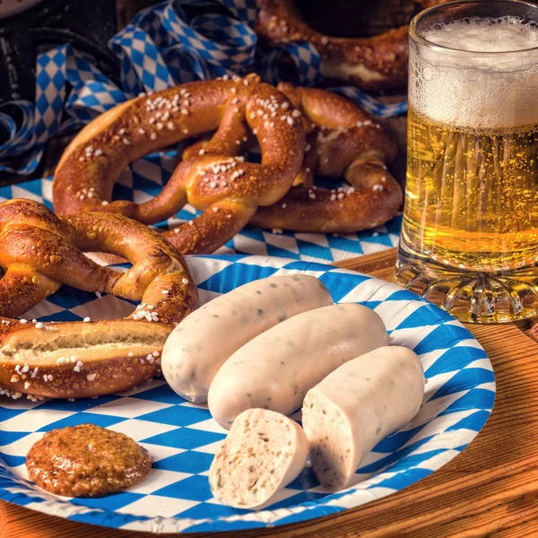 Bavarian sausage with pretzel — Stock Photo, Image