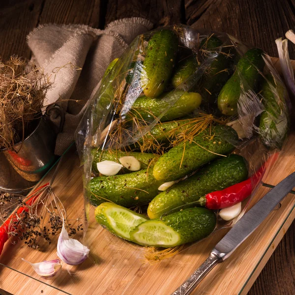 Salted cucumbers with spices — Stock Photo, Image