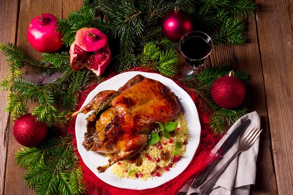 Duck with millet and pomegranate seeds — Stock Photo, Image