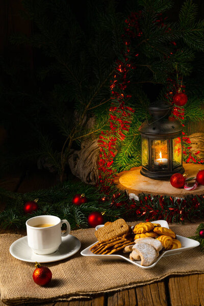 Different types of biscuits with rustic Christmas decorations