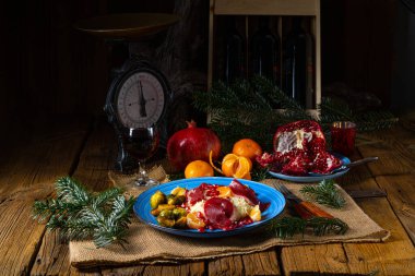 Brüksel lahanası, mandalina ve nar ile iyileşmiş kaz göğsü.