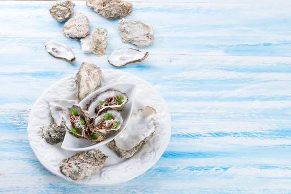 Oysters with parmesan — Stock Photo, Image