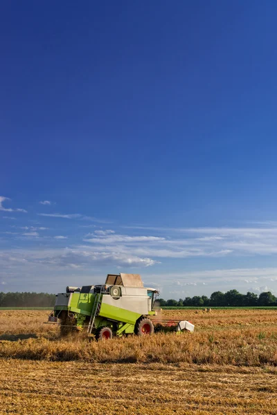 Tractors and harvesting — Stock Photo, Image