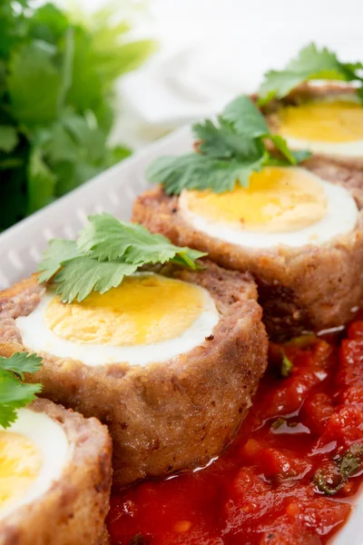 Eggs on Scottish on plate — Stock Photo, Image